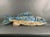 Intricately carved hanging wood fish. Carved with gills, eyes, fins etc. Colorfully painted in blues and cream. Overall...