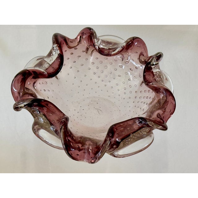 A controlled bubble or Bullicante clear and colored blown glass dish. Italian from the 60’s.