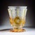 Elegant antique glass vase dating to the late 19th – early 20th century, crafted from clear and amber-colored glass with...