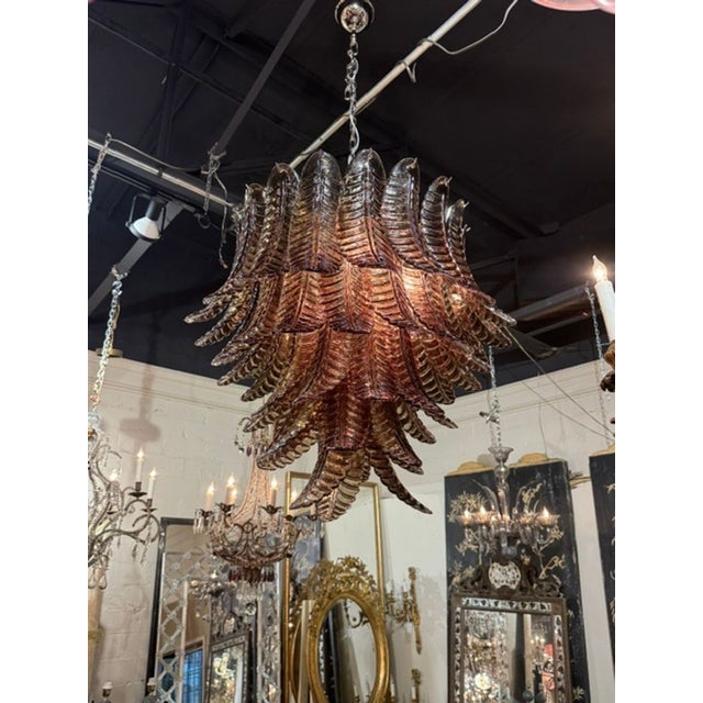 Murano Palm Leaf Chandelier in Tobacco Brown. A Murano palm‑leaf chandelier in tobacco brown is one of the most seductive...