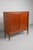 Cabinet from h.w. Klein for bramin. Made in germany in the 60’s. This teak and teak veneer cabinet has sliding doors...