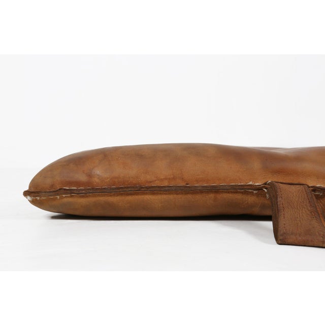 An authentic Belgian leather gym mat dating from the 1930s, showcasing the honest character and utilitarian beauty of...