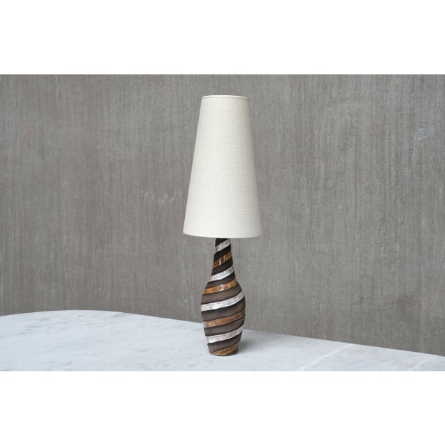This ceramic table lamp was designed by Ingrid Atterberg and produced by Upsala Ekeby in Sweden during the 1950s. Known as...