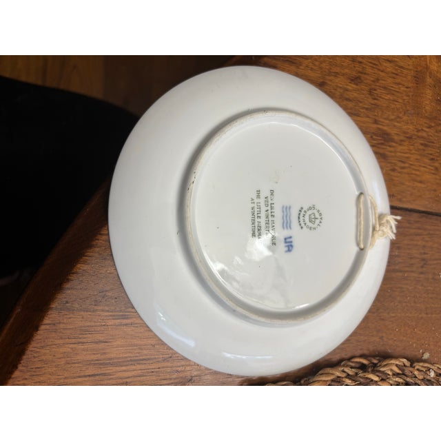 Royal Copenhagen Little Mermaid at Wintertime plate 1962 plate that measures 7 1/4"W and would make a pretty trinket dish...