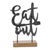 Bring a fun, welcoming vibe to your kitchen with the Eat Out Kitchen Sentiment Sign. This charming tabletop piece features...
