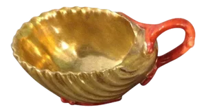 Early 19th Century French Empire Dagoty Old Paris Porcelain Gilt Shell Form Cup with Red Coral Handle