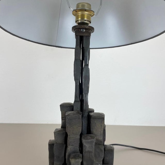Article: Brutalist cast iron table light Origin: Germany Producer and designer: Lothar Klute attrib. Material: cast iron...