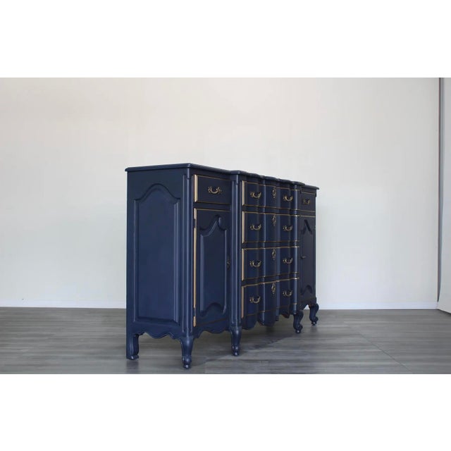 Late 20th century solid built French provincial sideboard This sideboard is newly refinished in navy blue with gold...
