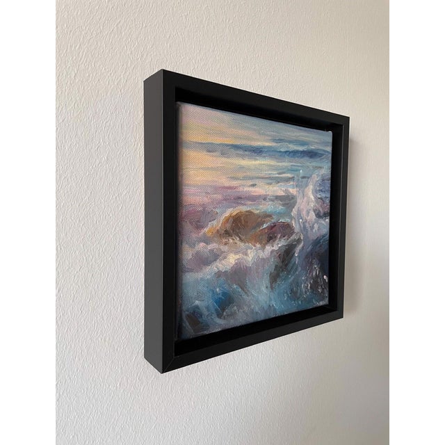 Dancing Waters I captures the dynamic movement of ocean waves, with vibrant blues and soft pastels blending seamlessly to...