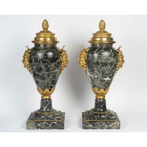 This pair of monumental cassolettes from the nineteenth century is an exceptional example of french decorative arts from...