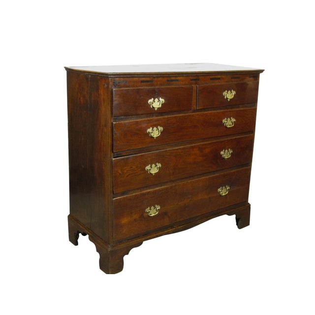 An 18th-C. English George II inlaid oak chest of drawers with two over three graduated drawers, inlaid ebony decorative...