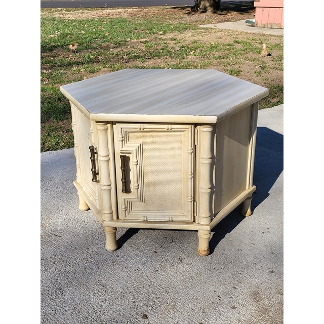 Very Boho Chic/Shabby Chic faux bamboo hexagon side table with faux bamboo brass handles. This piece is heavy and sturdy...