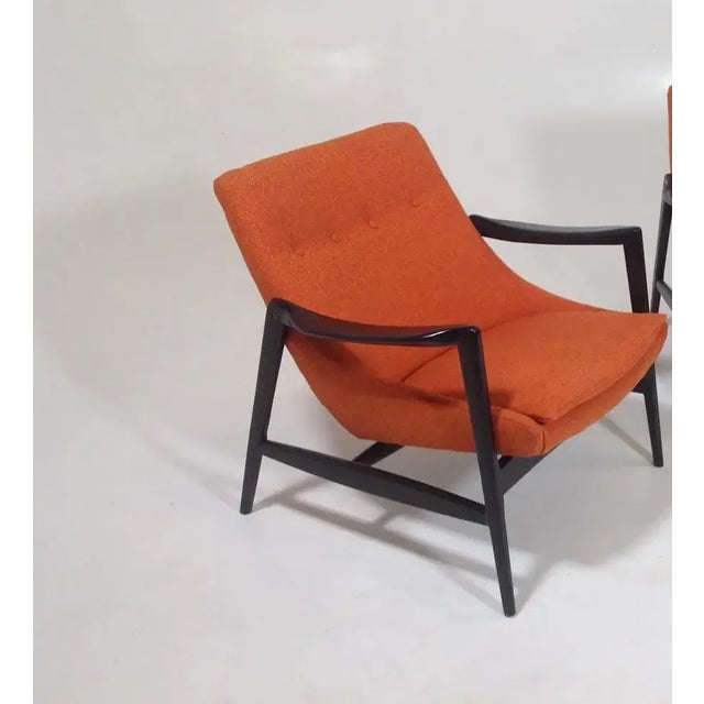 Mid-Century Modern lounge chair in the style of Ib Kofod-Larsen. Stunning lounge chair, mid-century style at its finest!...