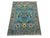 A sky blue field gives this Persian style rug a bright backdrop for its scrolling vines and stylized flowers. Cream,...