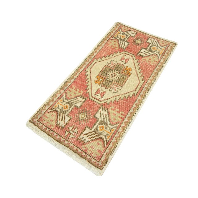 Vintage Handknotted decorative mini rug from Konya region of Turkey. Approximately 45-55 years old. In very good condition.