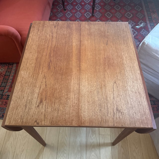 A beautifully designed Danish mid-century modern drop-leaf dining table crafted. Combining elegant proportions with...