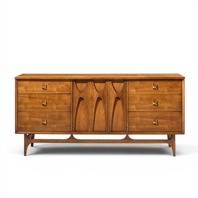 Broyhill Brasilia Mid Century Walnut and Brass 9-Drawer Lowboy Dresser This lowboy measures: 66 wide x 19 deep x 30.75...