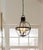 Inspired by a 19th century antique, this globe ceiling light has three lights. The hand-blown glass sphere emanates...