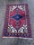 Handwoven wool rug from the 1970s