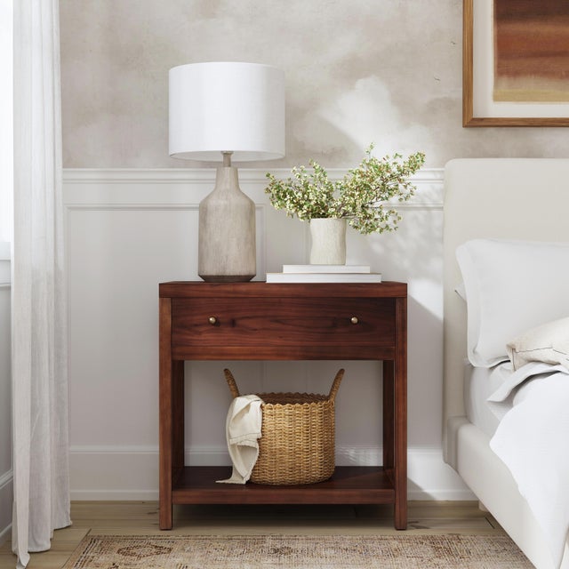 Enhance your bedroom or living space with the Butler Specialty Company Nora Wide Nightstand, a stylish blend of modern...