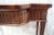 A Superb Victorian Mahogany serving table in the manner of Robert Adams, with a serpentine top above a patera moulded and...