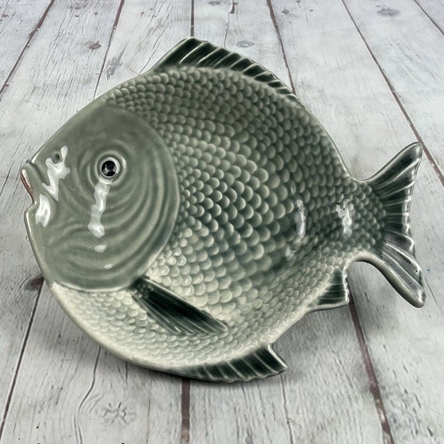 Bring coastal charm to your table with this beautiful Vintage Olfaire Majolica Fish Oceanic Plate, handcrafted in...