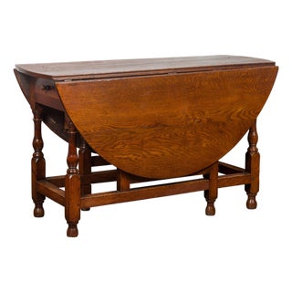 English Oval Oak Drop-Leaf Table with Single Drawer and Baluster Legs For Sale
