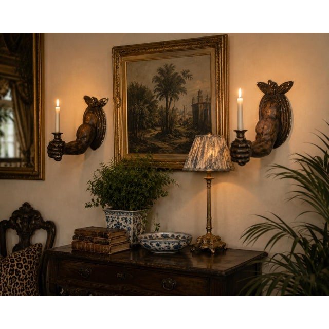 An unforgettable pair of vintage trompe l'oeil plaster candle sconces sculpted as outstretched arms emerging from...