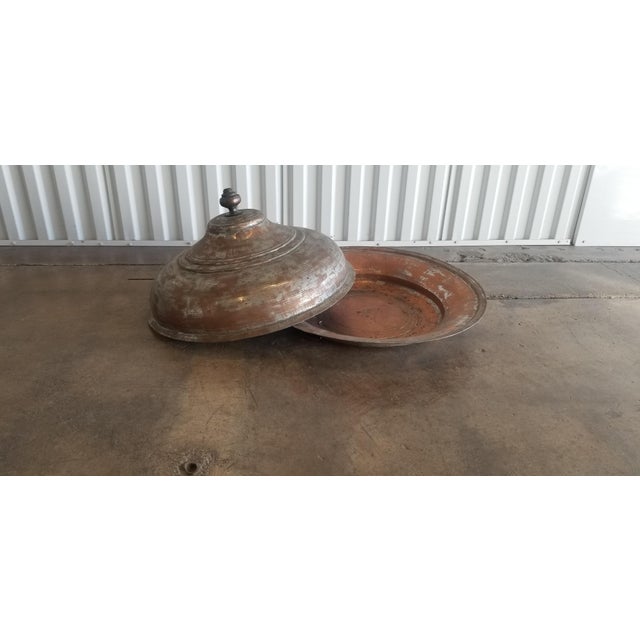 Wonderful large Moroccan food server and warmer, this piece measures 21" in diameter, and has a tall, pitched lid that...
