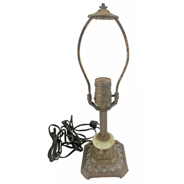 A refined 1930s Art Deco table lamp featuring a luminous jadeite glass break/spacer insert that exhibits a vibrant green...