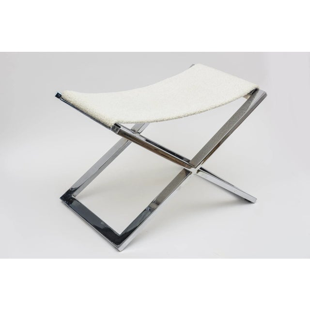 This lovely vintage 1980's vintage chromed steel X frame bench has been newly re-upholstered in an off white boucle fabric...