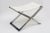 This lovely vintage 1980's vintage chromed steel X frame bench has been newly re-upholstered in an off white boucle fabric...