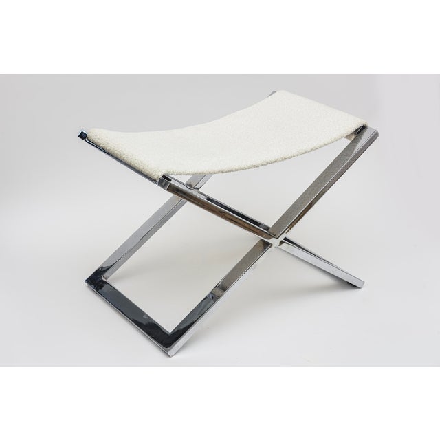 This lovely vintage 1980's vintage chromed steel X frame bench has been newly re-upholstered in an off white boucle fabric...