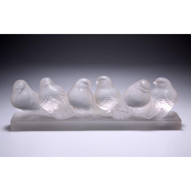 René Lalique "Group of 6 Sparrows" in pressed satin-finish molded glass, 8 x 29.5 x 6 cm Signed R. Lalique, France Model...