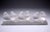 René Lalique "Group of 6 Sparrows" in pressed satin-finish molded glass, 8 x 29.5 x 6 cm Signed R. Lalique, France Model...