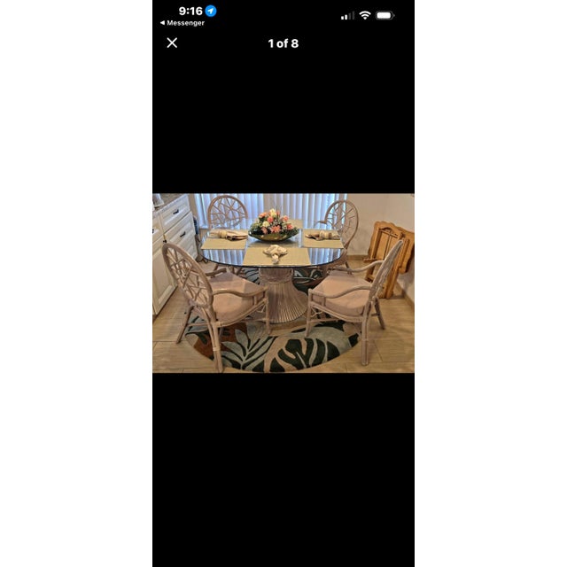 Stunning vintage McGuire style rattan dining set featuring the iconic sculptural Sheaf of Wheat pedestal table paired with...