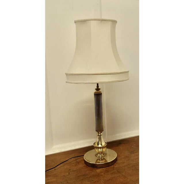 Central Brass Column Table Lamp This is an attractive lamp it has a single fluted column and is set on a round brass base...