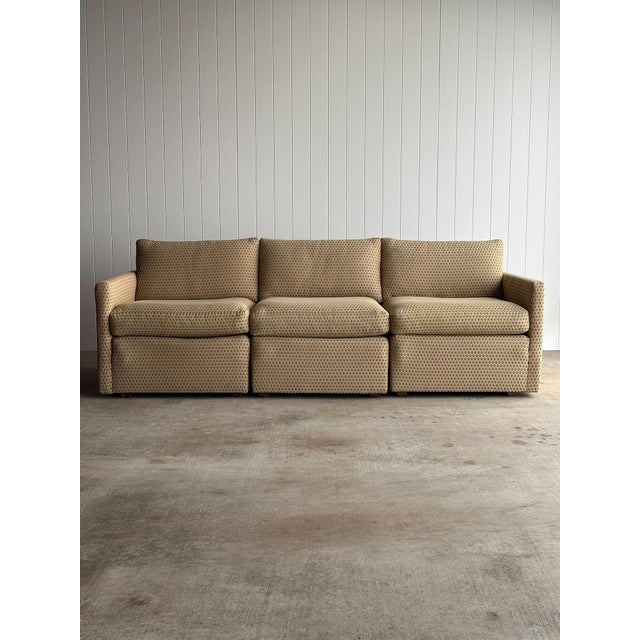 Vintage three-piece modular sectional sofa with squared arms and a low, grounded profile. Original patterned upholstery in...