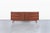 Allow me to present a stunning mid-century modern walnut dresser, a remarkable piece crafted by Lane Furniture in...