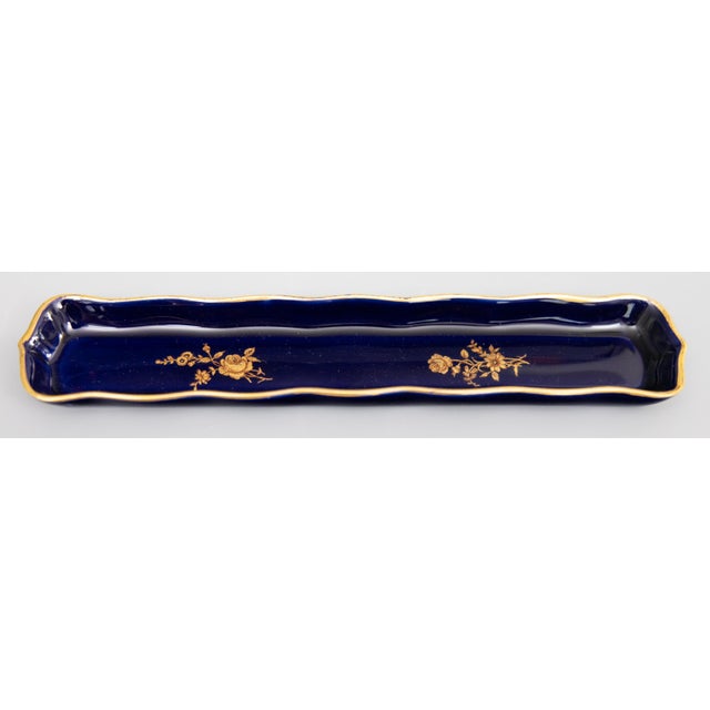 A lovely vintage French cobalt blue porcelain pen tray with gilt border and floral design. Marked "Rochard Limoges France"...