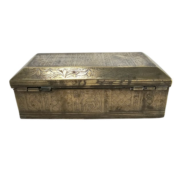 A finely hand-etched brass betel nut box from the Philippines, this antique piece reflects the ceremonial artistry of...