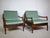 Danish Design teak lounge chairs from the 1960s. Stylish mid-century chairs with extendable seats and removable cushions....