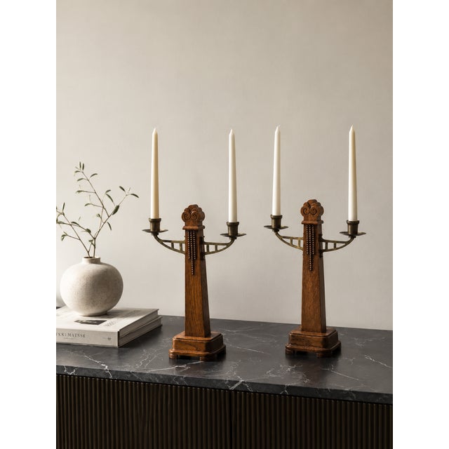 An exceptional and rare pair of original Dutch Art Deco candlesticks dating back to 1925, beautifully crafted in the...