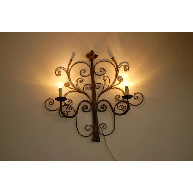 Metal flower wall lights dating back to the 60’s. With the exception of the ‘candles’, this piece is entirely made out of...