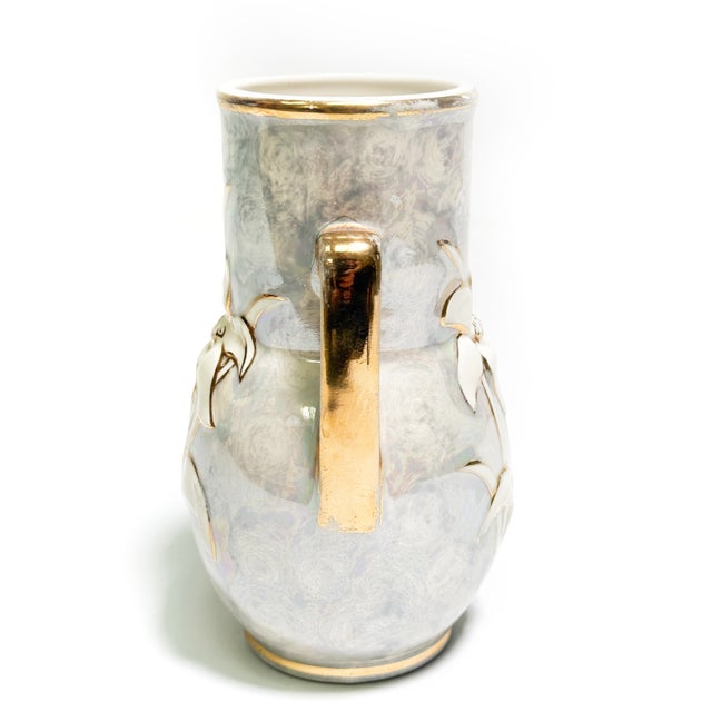 A beautiful vintage Pearl China Co. lusterware vase featuring a luminous iridescent finish, elegant twin handles, and a...