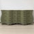 This is a wicker serpentine chest by WhiteCraft for Woodard. It has a travertine top that is not affixed to the piece....