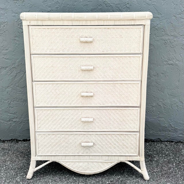 A charming vintage boho chic highboy dresser crafted in woven wicker with a soft, whitewashed finish. Featuring five...