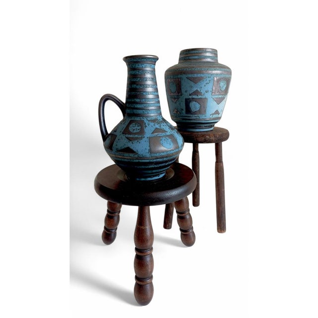 A beautiful and rare pair of Mid-Century Modern ceramic vases by Carstens Tönnieshof, designed by Helmut Scholtis. These...