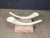 Striking vintage faux tusk coffee table made from tesselated stone with a beveled clear oval glass top. Beautiful and...