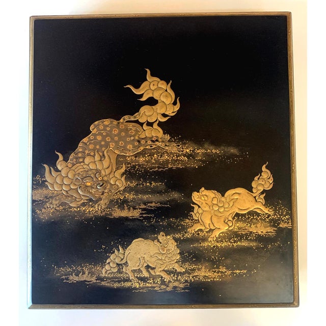 A lacquered wood box with lid from Japan circa 19th century Meiji Period. The finely decorated box was used to store paper...